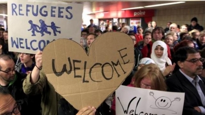 Orderly German welcome masks chaos for refugees