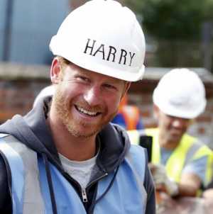 Princes William and Harry show off DIY skills for veterans building project