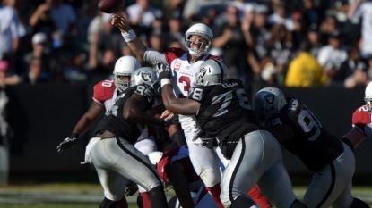 Carson Palmer’s off night caused by Raiders, holding ball too long