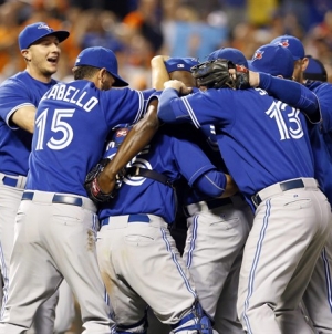 AL East champ Blue Jays rest starters in rainy loss to O’s