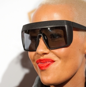 Amber Rose: Model strips off for female empowerment walk ‘No slut shaming!