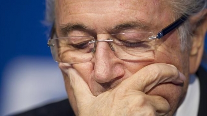 World football rocked by suspension of Blatter, Platini