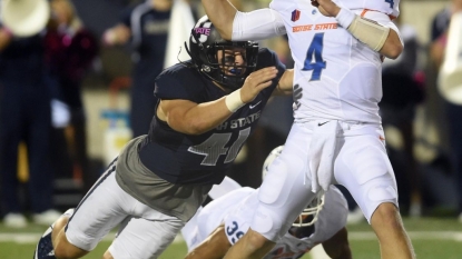 Utah St. forces 8 turnovers in upset of Boise St.