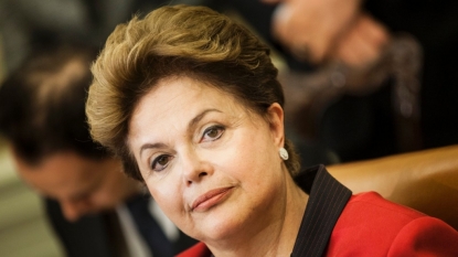 Brazilian president shakes up cabinet, trims salaries to boost support