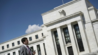 Fed keeps interest rate at effectively zero