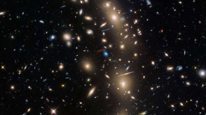 Hubble spots mother lode of 250 ancient tiny galaxies