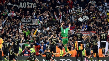 Juventus beats Sevilla to go top of Champions League group