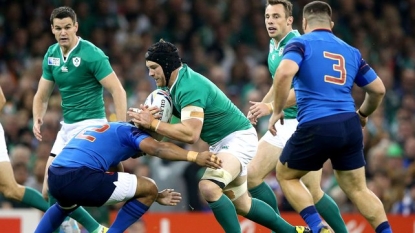 Ireland flanker Sean O’Brien punches France’s Pascal Pape in Rugby