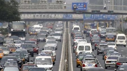 Fifty lane highway becomes carpark as Beijing residents return home after long