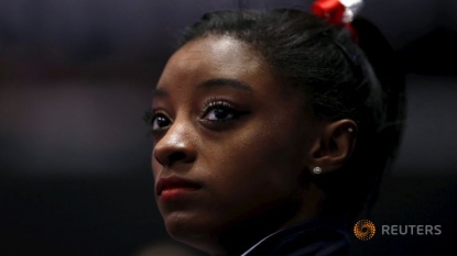 US women roll to 3rd straight world gymnastics title