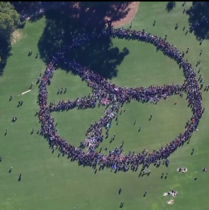 2000 form human peace sign to honor John Lennon in NYC