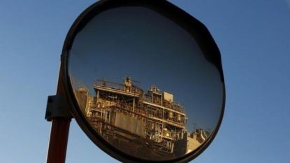 Crude oil prices edge up; but oversupply, strong dollar drag