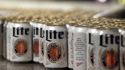 AB InBev launches SAB bid, to sell MillerCoors stake