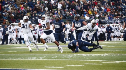 Mangum throws four touchdowns in BYU win over Utah State