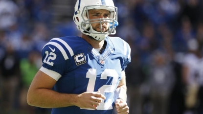 2 protesters rappel from balcony at Colts-Panthers game