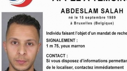 Brussels on lockdown as Paris attacks suspect on the run