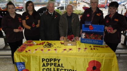 Buses decorated with poppies for Remembrance Day