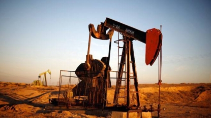 Crude oil slides again; market fears inventory glut