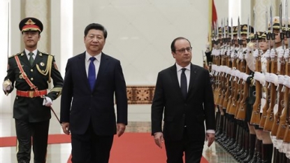 French president heading to China to promote climate talks