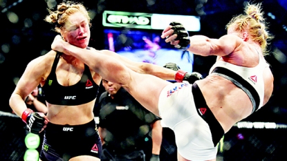 Holly Holm stuns Ronda Rousey with second-round knockout