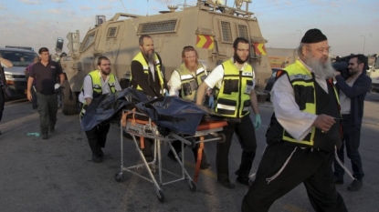 Israeli woman stabbed to death, three attackers killed