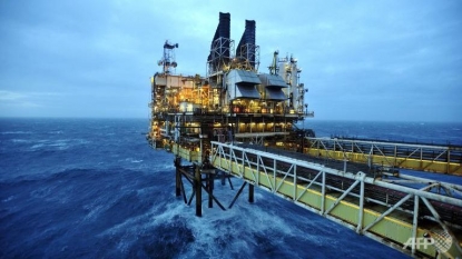 Oil prices ease on supply glut