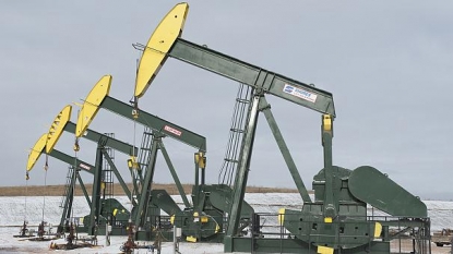 Record stocks may deepen oil rout: IEA