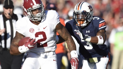 Henry, Alabama run past Auburn