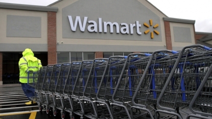 Wal-Mart earnings dip but beat expectations