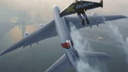 Incredible video shows plane flying next to two people with jetpacks