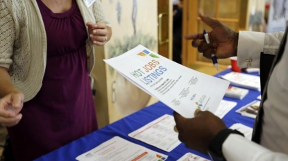 Applications for US jobless aid rose slightly last week