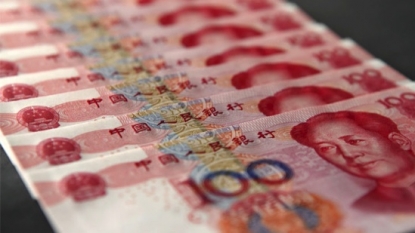 IMF Approves Reserve Currency Status for China’s Yuan