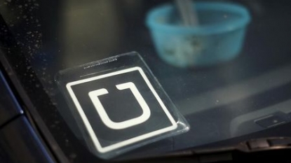 Uber launches taxi-hailing button for third-party app developers