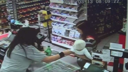 Clerk grabs baby from woman before she collapses in store