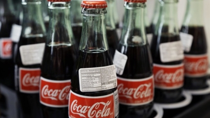 Coca-Cola sales fall on strong dollar, weak Europe demand