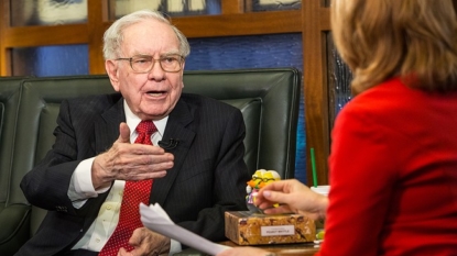 Buffett Buys Big Slice of Apple