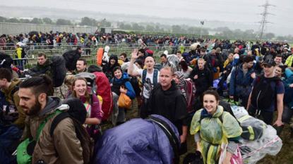 Glastonbury 2016: Girls get naked and flash boobs as weather clears up