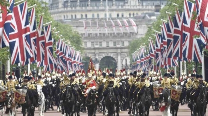 Rain dampens birthday lunch, but not spirits for Queen’s 90th