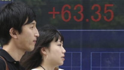 Asian shares cheered by Wall Street, dollar, Group of 20