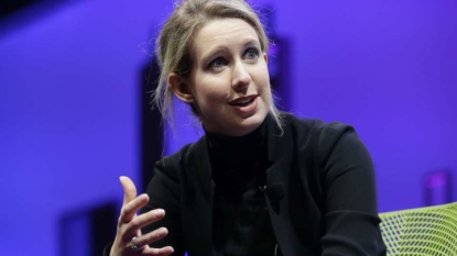 Feds ban Theranos CEO Holmes from running lab for 2 years