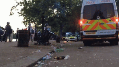 Police officer among three people stabbed when water fight crowd turns hostile