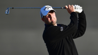 Thomas, Reed grab early lead at British Open