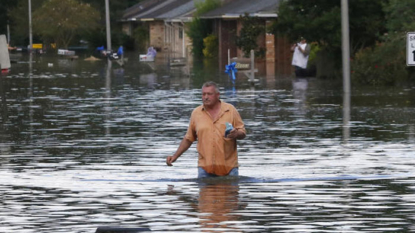 Louisiana residents survey flood damage as eight death reported