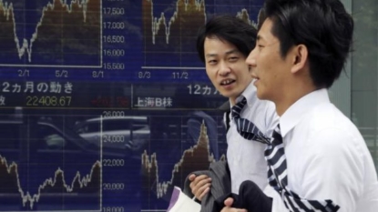 Asian stocks gain after China data, oil retreats