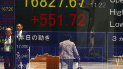 Asian shares fall while dollar stands tall