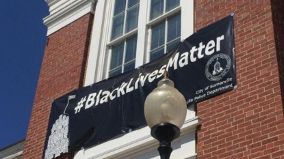 Police protest Black Lives Matter banner at Somerville City Hall