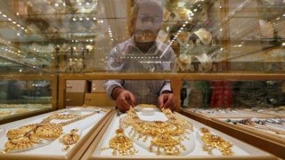 Gold down more than 1% on US Fed rate hike views