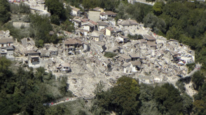 Italy lowers quake death toll back to 290