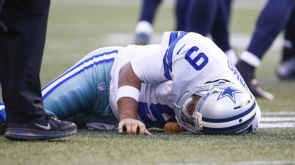 Cowboys quarterback Romo has broken bone in back