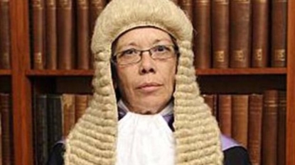 Judge hailed after four-letter court exchange with racist thug